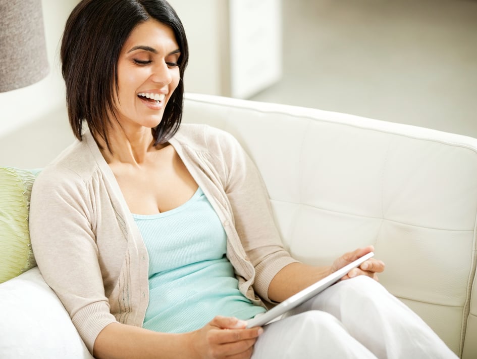 Woman Enjoying an Ipad